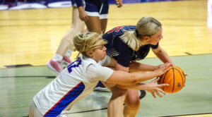 Kellogg nets 32 as No. 2 Morgantown races past No. 7 Washington 86-54 to advance to state semifinals